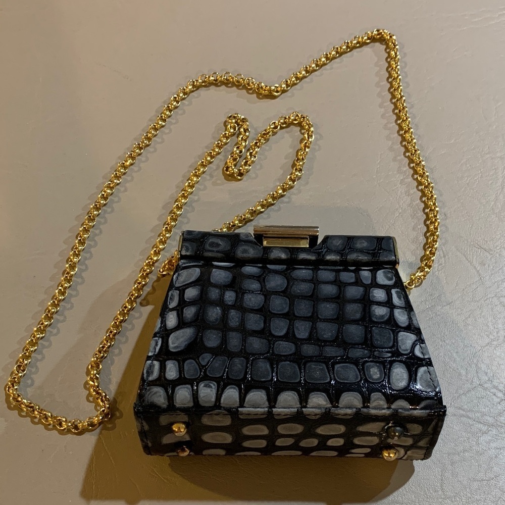 Chic Black and Gold Mini Bag with Chain​​​​